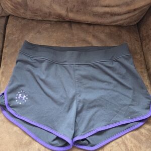 Under Armour Women's Athletic Shorts in Black with Purple Trim